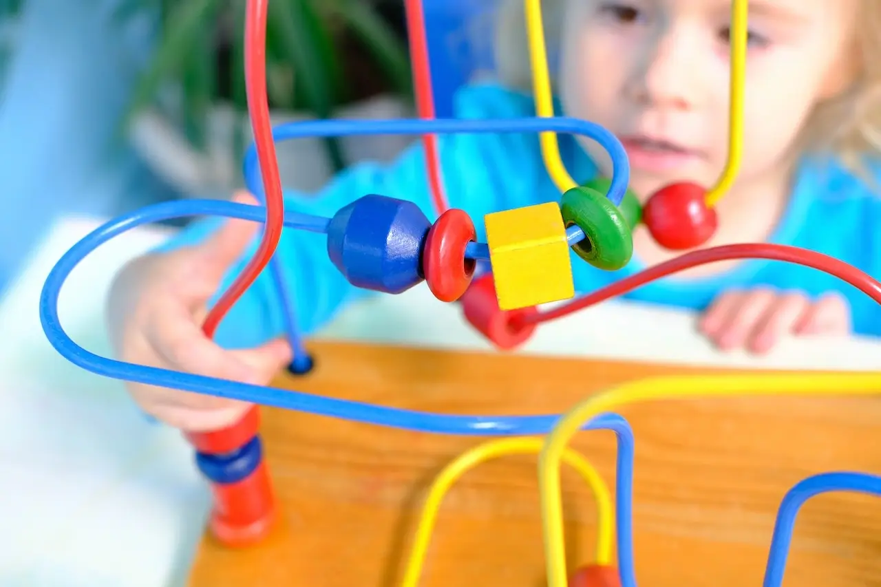 Child playing with a toy